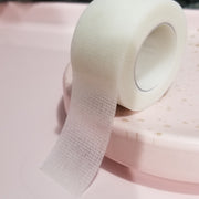 White  sensitive skin tape similar to 3M nexcare tape