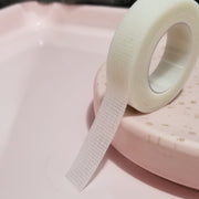 White sensitive skin tape similar to nexcare tape